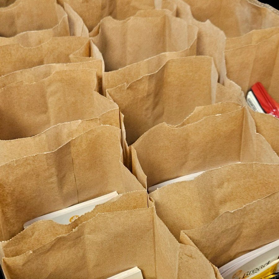 Rows of brown sack lunch bags packed and ready