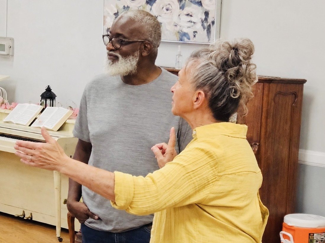Volunteers sharing fellowship during a nursing-home visit